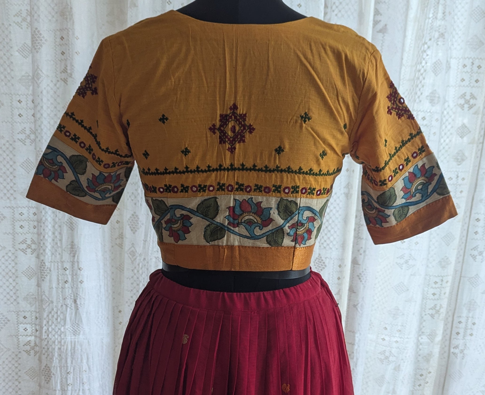 Saffron Blossom Kalamkari with Kutch Embroidered Blouse