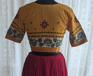 Saffron Blossom Kalamkari with Kutch Embroidered Blouse