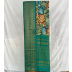 Load image into Gallery viewer, Kamdhenu Teal Kanchi Kalamkari Saree
